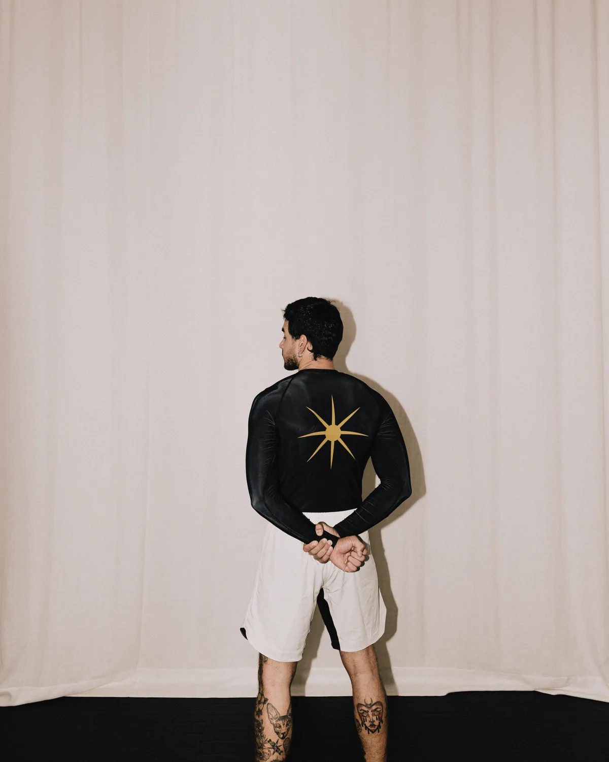 Rashguard · Squid Ink, back, sea urchin in Amber